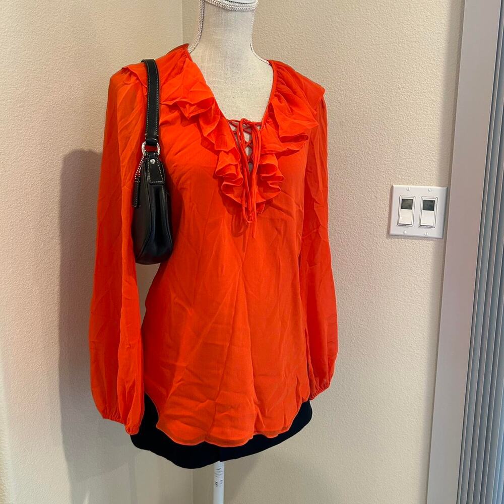 Ralph Lauren orange top with ruffle collar. Size small petite